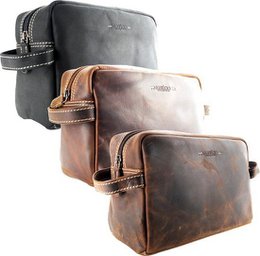 Leather toiletry bag in cognac, black, and dark brown colors. Rectangular shape with zipper closure and leather handles. Suitable for storing and organizing personal care items.