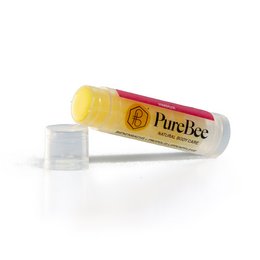 Raspberry-flavored lip balm in a yellow tube with the PureBee logo.