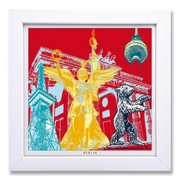 A colorful art print featuring a golden statue against a red background with various architectural elements, including a tower and other structures. The image suggests a vibrant, urban setting.
