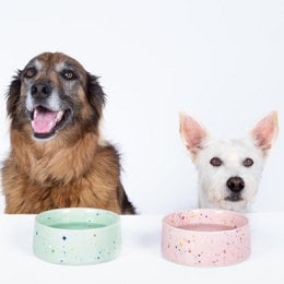 Two round, green pet food bowls with a speckled pattern. The bowls are 14cm in diameter and come as a set of 2.