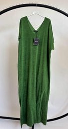 "Long flowing maxi dress, V-neck, soft jersey material, available in green, pink, beige, coral, and brown tones"