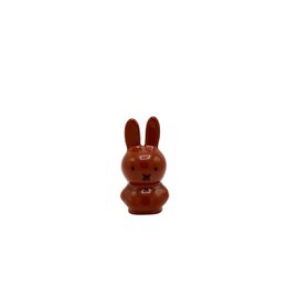  Small brown rabbit figurine with long ears and a round body.