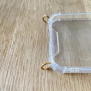 Mobile phone case transparent with golden rings