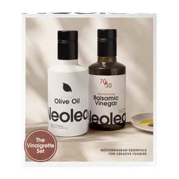 Olive oil and balsamic vinegar set, featuring Mediterranean-inspired flavors for gourmet cooking.