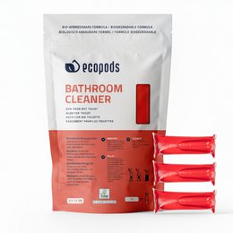 A set of 3 bathroom cleaning products in a brown paper bag. The products are red in color and appear to be cleaning bars or tablets.