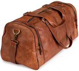  A large, brown leather weekend bag with multiple compartments and straps for easy carrying. The bag has a classic, rugged design suitable for travel or everyday use.
